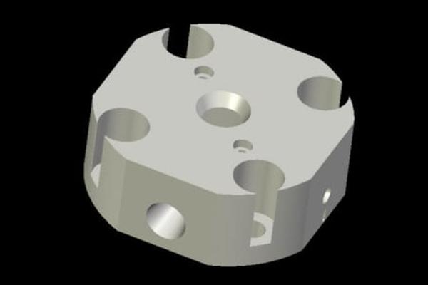 Precision machined component CAD 3D model — octagonal body with bored holes modeled from 2D drawings