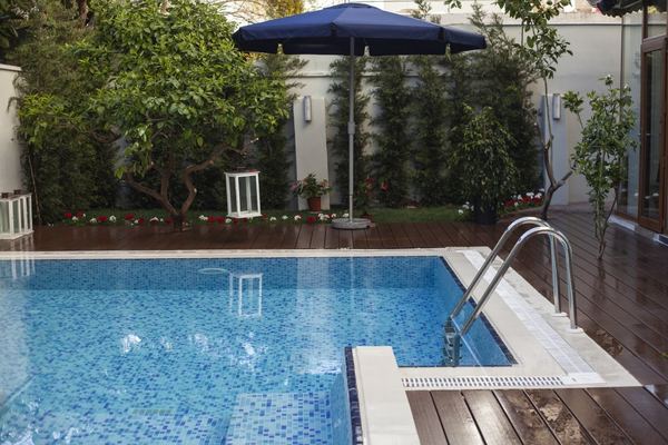 Residential exterior with pool — photorealistic architectural render from CAD drawings